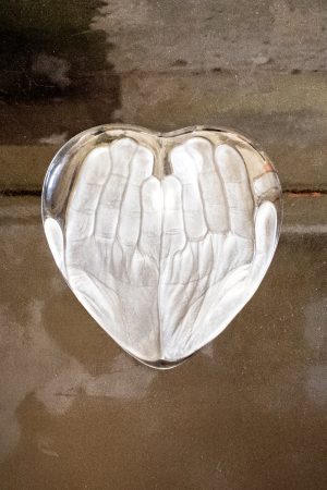 Heart Supported by Hands